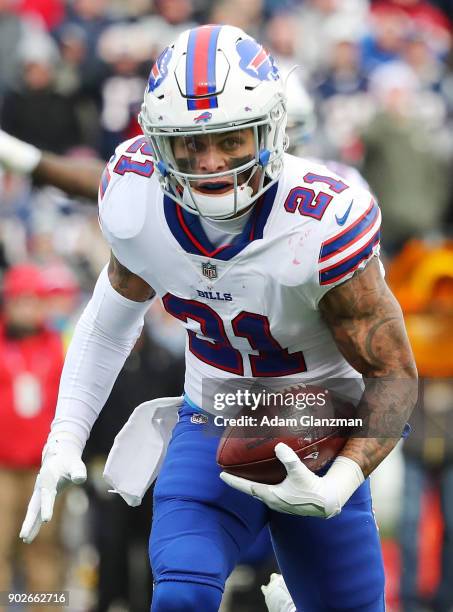 Jordan Poyer of the Buffalo Bills runs the ball during a game against the New England Patriots at Gillette Stadium on December 24, 2017 in Foxboro,...