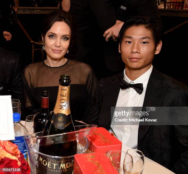 Angelina Jolie and Pax Thien Jolie-Pitt attend the 75th Annual Golden Globe Awards held at The Beverly Hilton Hotel on January 7, 2018 in Beverly...