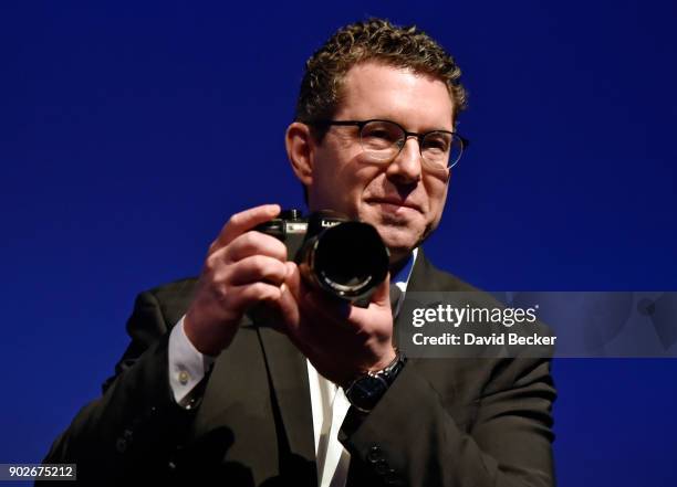 Panasonic Consumer Electronics Company President Michael Moskowitz displays the Lumix GH5S mirrorless camera during a press event for CES 2018 at the...