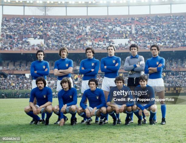 The Italian team pose for photographers prior to the 3rd & 4th place play-off between Italy and Brazil at the Estadio Monumental in Buenos Aires,...