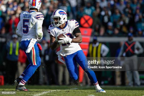 Buffalo Bills wide receiver Deonte Thompson takes a handoff during the AFC Wild Card game between the Buffalo Bills and the Jacksonville Jaguars on...