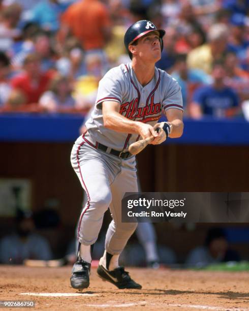 Dale Murphy of the Atlanta Braves bats during an MLB game versus the New York Mets at Shea Stadium in Queens, NY during the 1994 season.