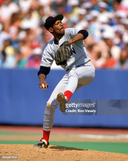 Dennis "Oil Can" Boyd of the Boston Red Sox pitches during an MLB game against the Toronto Blue Jays at Exhibition Stadium in Toronto, Ontario,...