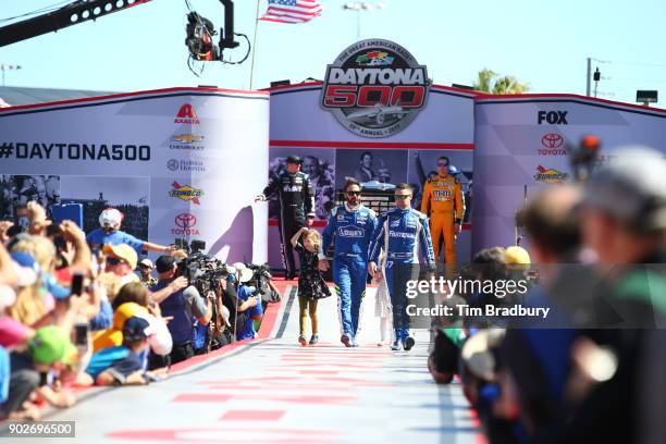 Jimmie Johnson, driver of the Lowe's Chevrolet, with his daughters Genevieve Johnson and Lydia Norriss and driver Ricky Stenhouse Jr., driver of the...