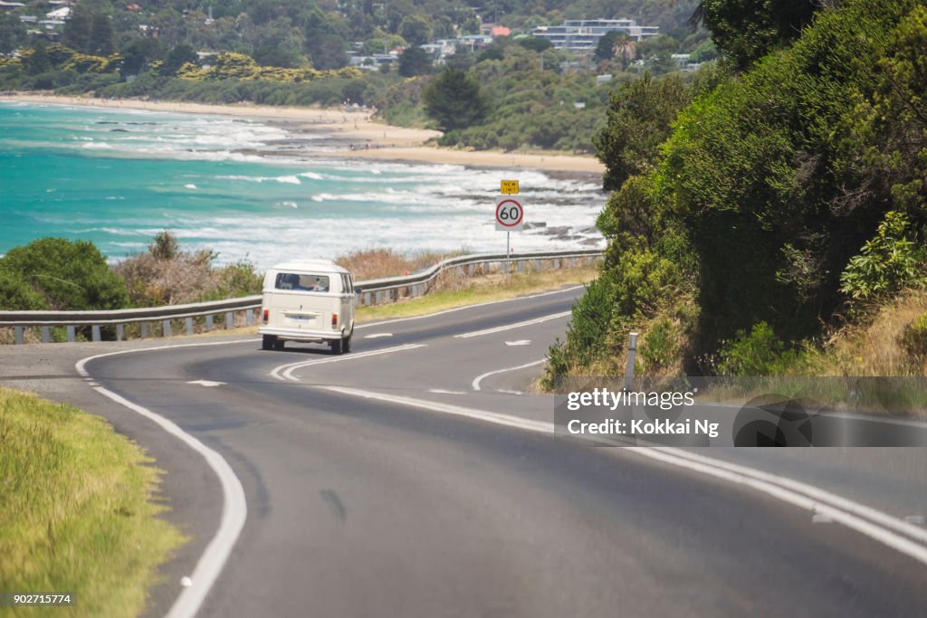 Volkswagen Kombi van driving down Great Ocean Road