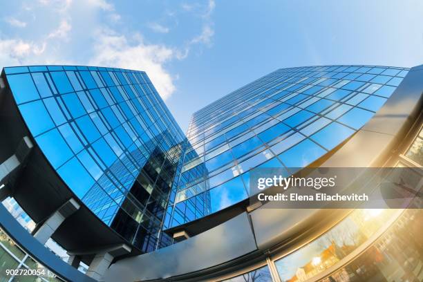 glass facade of office building - eliachevitch stock pictures, royalty-free photos & images