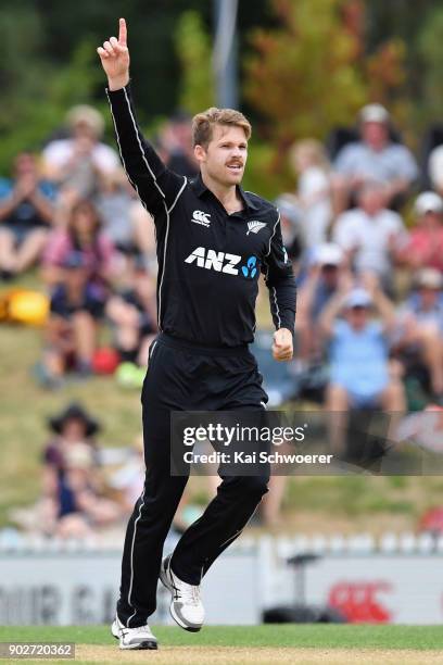 Lockie Ferguson of New Zealand celebrates after dismissing Babar Azam of Pakistan during the second match in the One Day International series between...