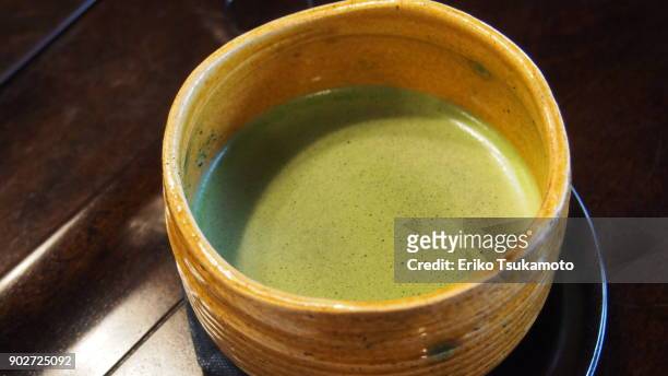 japanese matcha tea in a chaki (tea bowl) - dazaifu stock-fotos und bilder