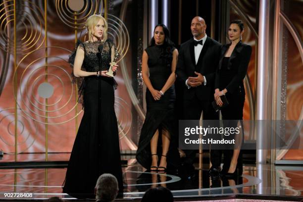 In this handout photo provided by NBCUniversal, Nicole Kidman accepts the award for Best Performance by an Actress in a Limited Series or Motion...