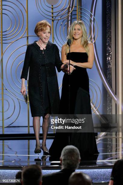 In this handout photo provided by NBCUniversal, Presenters Carol Burnett and Jennifer Aniston onstage during the 75th Annual Golden Globe Awards at...