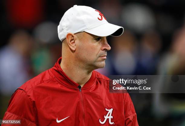 Alabama Crimson Tide defensive coordinator Jeremy Pruitt walks on the field during warm ups prior to the game against the Georgia Bulldogs in the CFP...