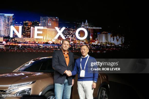 Hyundai vice chairman Eui Sun Chung and Aurora Innovation founder Chris Urmson present the Nexo, a hydrogen fuel-cell powered vehicle, at the...