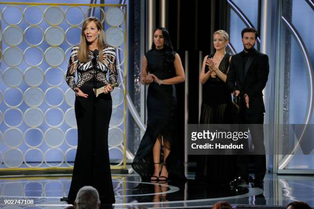 In this handout photo provided by NBCUniversal, Allison Janney accepts the award Best Performance by an Actress in a Supporting Role in a Motion...