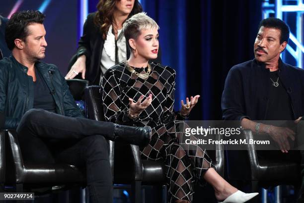 Judges Luke Bryan, Katy Perry and Lionel Richie of the television show American Idol speak onstage during the ABC Television/Disney portion of the...