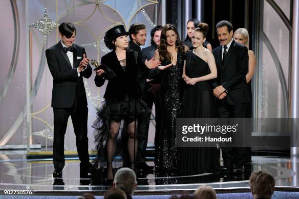 In this handout photo provided by NBCUniversal, Amy Sherman-Palladino accepts the award for Best Television Series – Musical or Comedy for “The...
