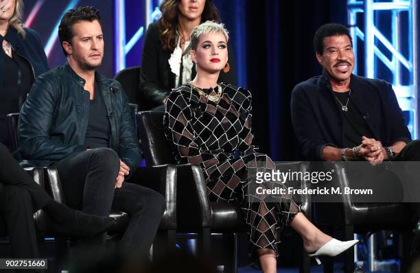 Judges Luke Bryan, Katy Perry and Lionel Richie of the television show American Idol speak onstage during the ABC Television/Disney portion of the...