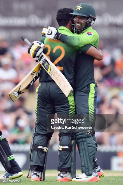 Hasan Ali of Pakistan is congratulated by Shadab Khan of Pakistan after scoring his first ODI half century during the second match in the One Day...
