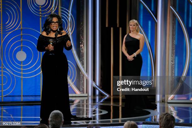 In this handout photo provided by NBCUniversal, Oprah Winfrey accepts the 2018 Cecil B. DeMille Award during the 75th Annual Golden Globe Awards at...