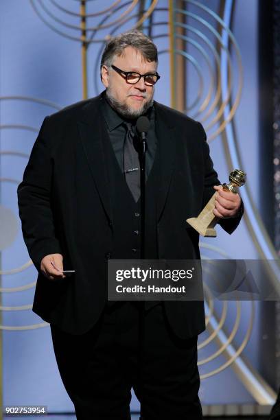 In this handout photo provided by NBCUniversal, Guillermo del Toro accepts the award for Best Director – Motion Picture for “The Shape of Water”...