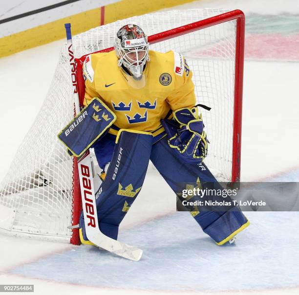 Filip Gustavsson of Sweden defends his net against team Canada during the third period of play in the IIHF World Junior Championships Gold Medal game...