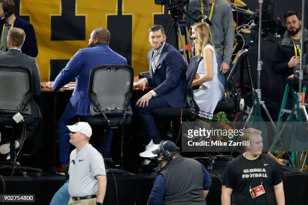 Tim Tebow, TV personality, looks on during the game between the Georgia Bulldogs and the Alabama Crimson Tide in the CFP National Championship...