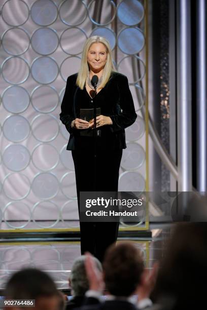 In this handout photo provided by NBCUniversal, Presenter Barbra Streisand speaks onstage during the 75th Annual Golden Globe Awards at The Beverly...