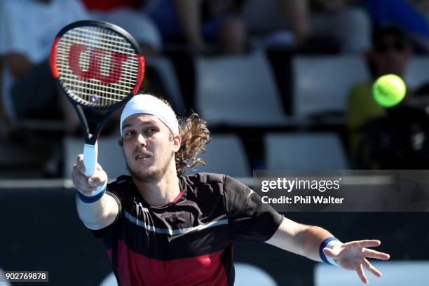 Lukas Lacko of Slovakia plays a forehand in his first round match against Stefanos Tsitsipas of Greece during day two of the ASB Men's Classic at ASB...