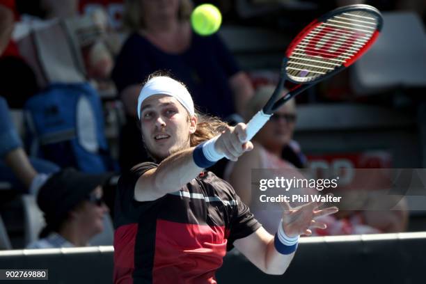 Lukas Lacko of Slovakia plays a forehand in his first round match against Stefanos Tsitsipas of Greece during day two of the ASB Men's Classic at ASB...