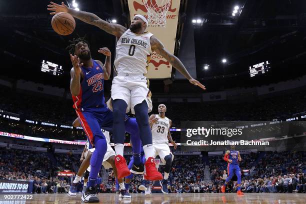 Reggie Bullock of the Detroit Pistons drives against DeMarcus Cousins of the New Orleans Pelicans during the second half at the Smoothie King Center...