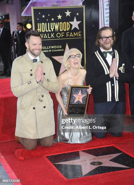 Actor Joel McHale, actress Gillian ANderson and writer Bryan Fuller at her star ceremony on The Hollywood Walk of Fame on January 8, 2018 in...