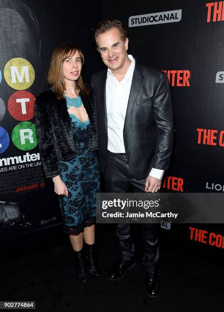 Screenwriter Byron Willinger and guest attend the "The Commuter" New York Premiere at AMC Loews Lincoln Square on January 8, 2018 in New York City.