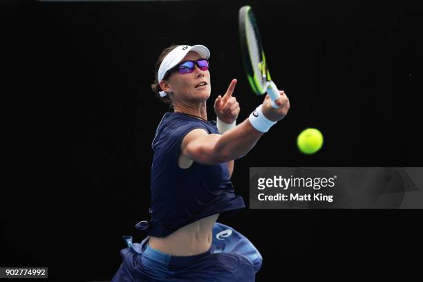 Samantha Stosur of Australia plays a forehand in her 1st round match against Carina Witthoeft of Germany during day three of the 2018 Sydney...
