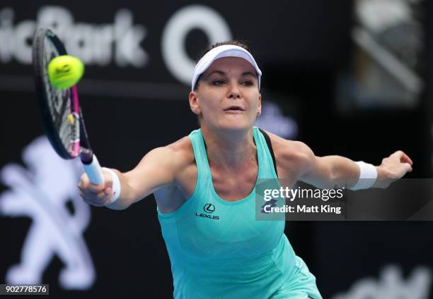 Agnieszka Radwanska of Poland plays a forehand in her 1st round match against Johanna Konta of Great Britain during day three of the 2018 Sydney...