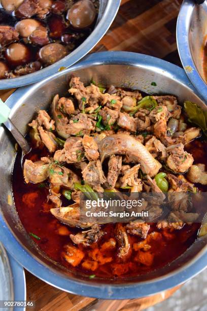 spicy chicken with beans in laos - vendor selling pulses in local market stock pictures, royalty-free photos & images