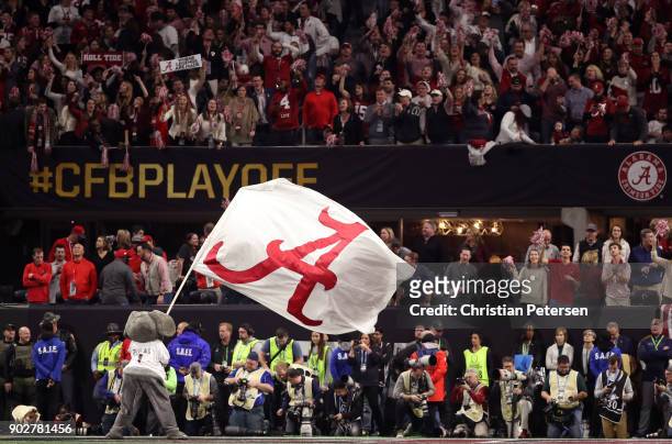 Big Al, the mascot for the Alabama Crimson Tide, waves a flag in the end zone during the second half against the Georgia Bulldogs in the CFP National...