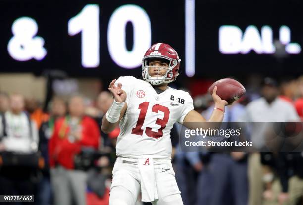 Tua Tagovailoa of the Alabama Crimson Tide throws a pass during the second half against the Georgia Bulldogs in the CFP National Championship...