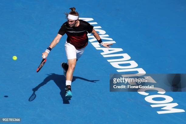 Lukas Lacko of Slovakia plays a backhand in his first round match against Stefanos Tsitsipas of Greece during day two of the ASB Men's Classic at ASB...