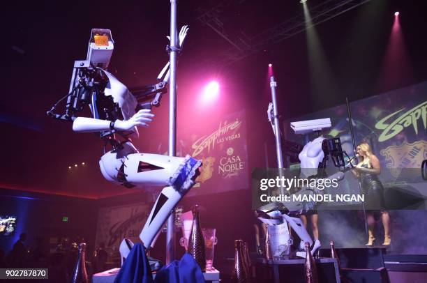 Stripper robots perform at the Sapphire Gentlemen's Club on the sidelines of CES 2018 in Las Vegas on January 8, 2018.