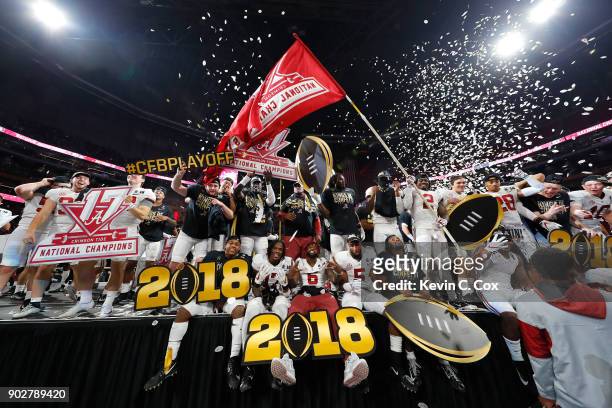 The Alabama Crimson Tide celebrates beating the Georgia Bulldogs in overtime and winning the CFP National Championship presented by AT&T at...
