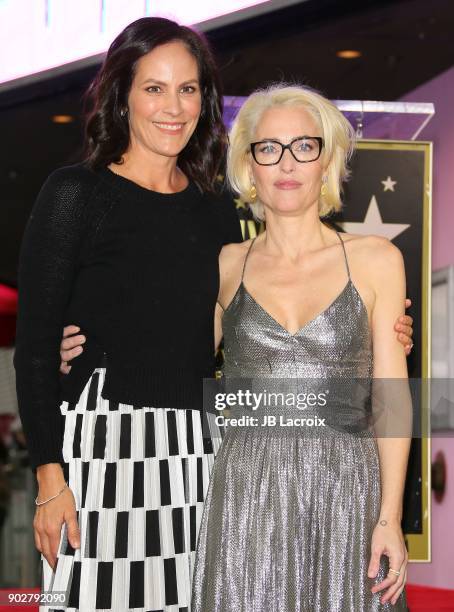 Annabeth Gish and Gillian Anderson attend a ceremony honoring her with a star on The Hollywood Walk of Fame on on January 8, 2018 in Los Angeles,...