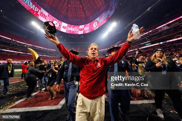 Head coach Nick Saban of the Alabama Crimson Tide celebrates beating the Georgia Bulldogs in overtime to win the CFP National Championship presented...