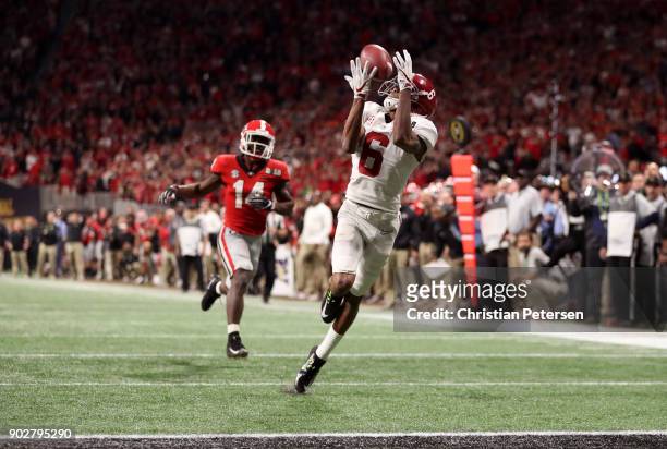 DeVonta Smith of the Alabama Crimson Tide catches a 41 yard touchdown pass to beat the Georgia Bulldogs in the CFP National Championship presented by...
