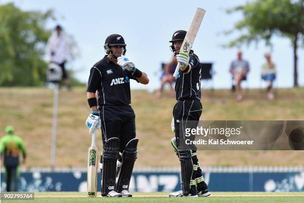 Martin Guptill of New Zealand celebrates his half century during the second match in the One Day International series between New Zealand and...