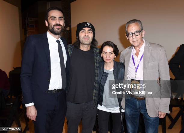 Artistic director of the Palm Springs International Film Festival Michael Lerman, Fatih Akin, Nurhan Sekerci-Porst and David Ansen attend the Foreign...