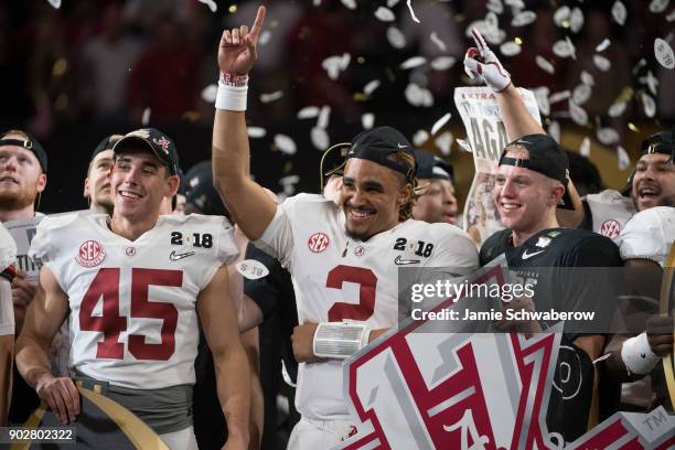 Jalen Hurts of the Alabama Crimson Tide celebrates after defeating the Georgia Bulldogs during the College Football Playoff National Championship...