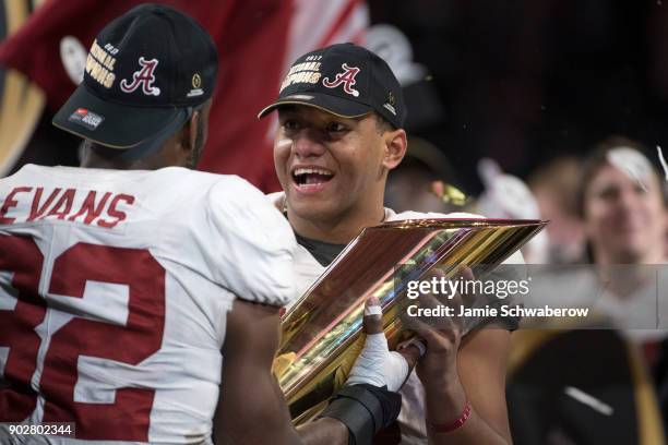 Tua Tagovailoa and Rashaan Evans of the Alabama Crimson Tide celebrates after defeating the Georgia Bulldogs during the College Football Playoff...