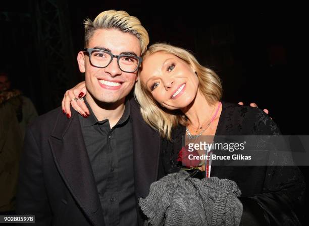 Michael Consuelos and Kelly Ripa pose backstage as Jake Shears of the rock group "The Scissor Sisters" makes his Broadway debut in the hit musical...