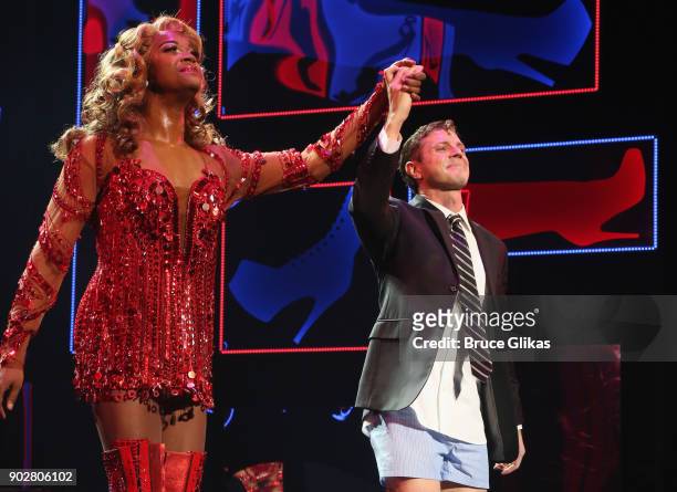 Harrison Ghee and Jake Shears of the rock group "The Scissor Sisters" take the curtain call as Shears makes his Broadway debut in the hit musical...
