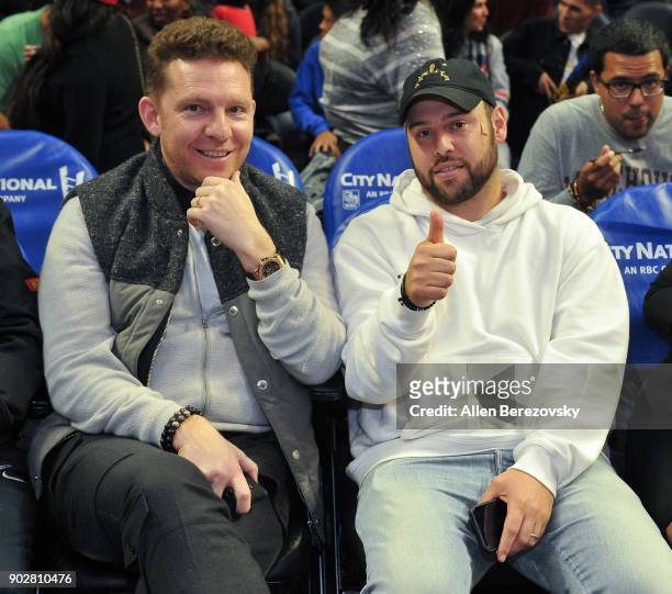 Nick Candy and Scooter Braun attend a basketball game between the Los Angeles Clippers and the Atlanta Hawks at Staples Center on January 8, 2018 in...