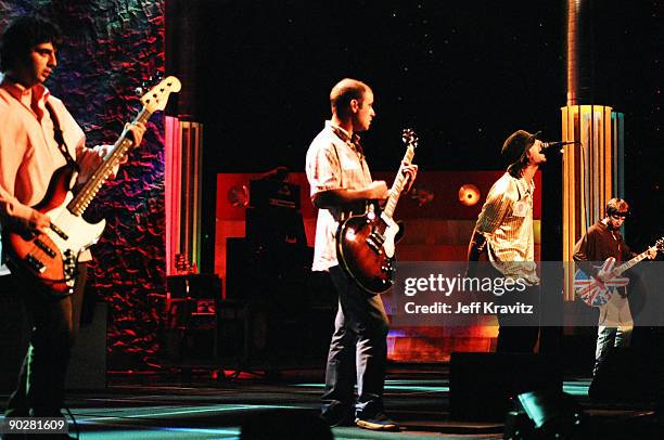 Paul "Guigsy" McGuigan, Paul "Bonehead" Arthurs, Noel Gallagher and Liam Gallagher of Oasis